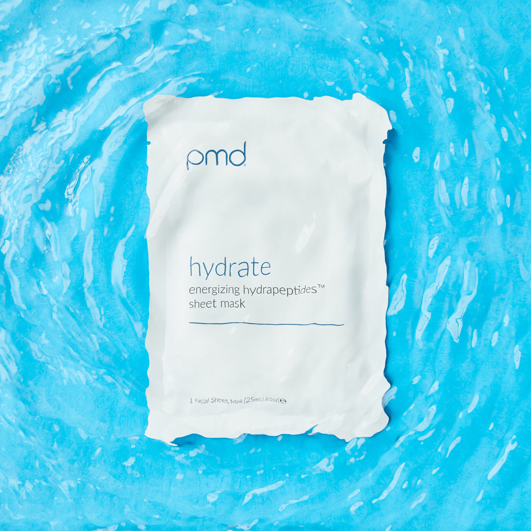 1051-Hydrate?Hydrate Energizing HydratingPeptides Sheet Mask in Packaging under water and with blue background